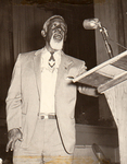 Clarence Muse speaking at an event